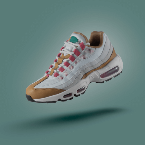 tennis shoe floating on a blue background